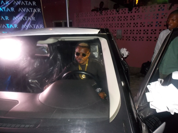 femi with car.jpg image