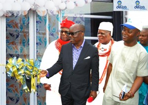 Former Governor of Delta State, Emmanuel Uduaghan commissioning the newly built Delta Mall in Effurun Warri, Delta State. With him is His Highness Emmanuel Sideso Abe 1 of Ovie, Uwie Kingdom of Delta State, one of his High Chiefs and Olumide Akinsanya of Delta Mall.