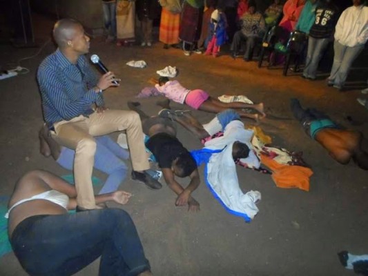 South African Pastor Commands Congregation to Eat Snakes & They Obey – PHOTOS