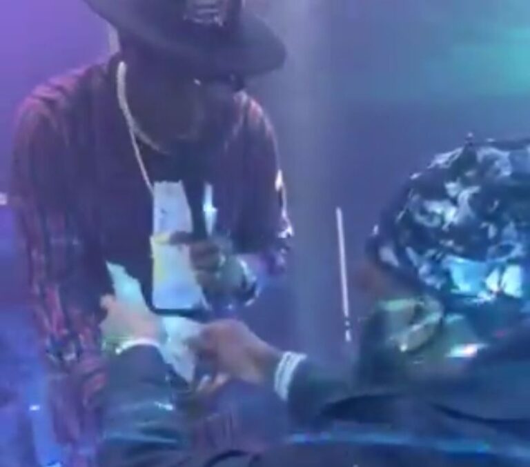 Viral Moment as Burna Boy Sprays Fuji Legend Adewale Ayuba at Live Show